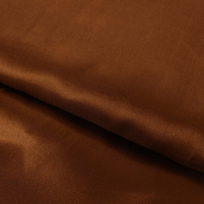 Brown satin fabric texture, smooth and shiny.