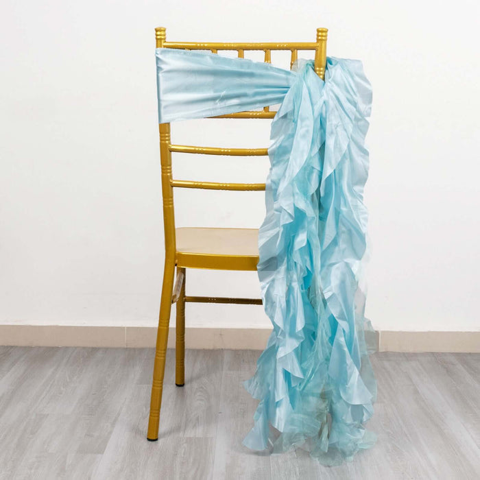 Light blue ruffled chair sash draped on a gold chiavari chair.