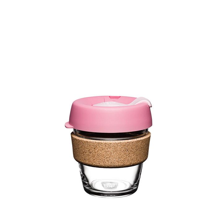 KeepCup Brew Cork XS 6oz in Saskatoon, featuring a clear tempered glass cup with a natural cork band and dusty pink lid with a light pink plug, shown against a white background.