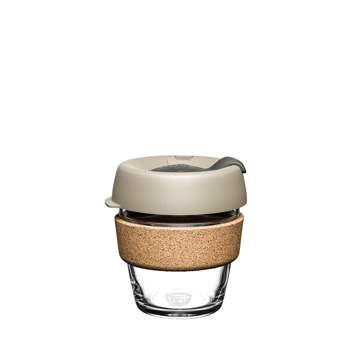 KeepCup Brew Cork XS 6oz in Filter colour, featuring a clear glass cup with natural cork band and warm grey silicone lid with sip hole, photographed front-on against a white background.