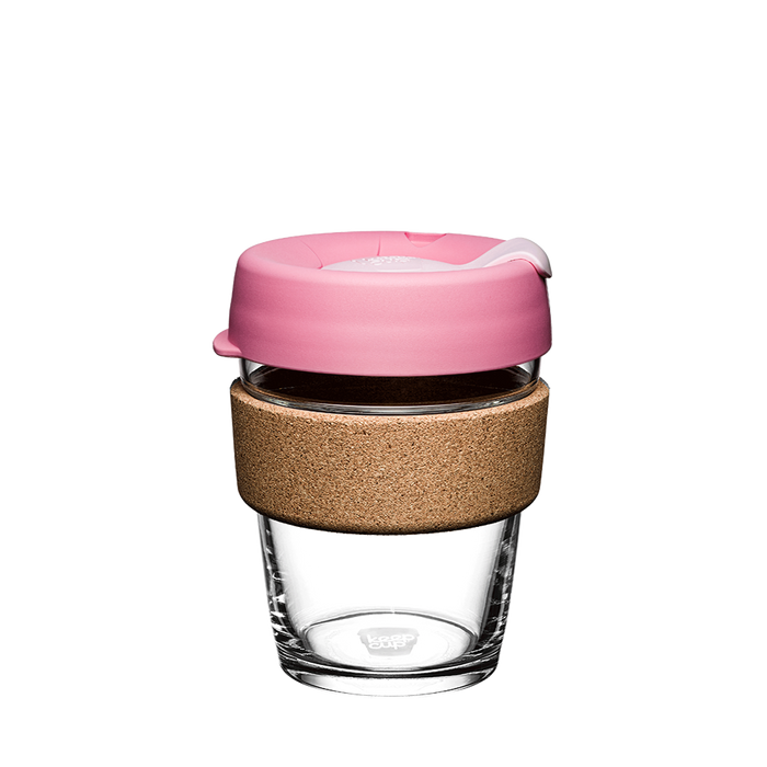 KeepCup Brew Cork in Saskatoon, medium 12oz size, featuring a clear glass cup with natural cork band and pink silicone lid with sip hole, shown against a white background.