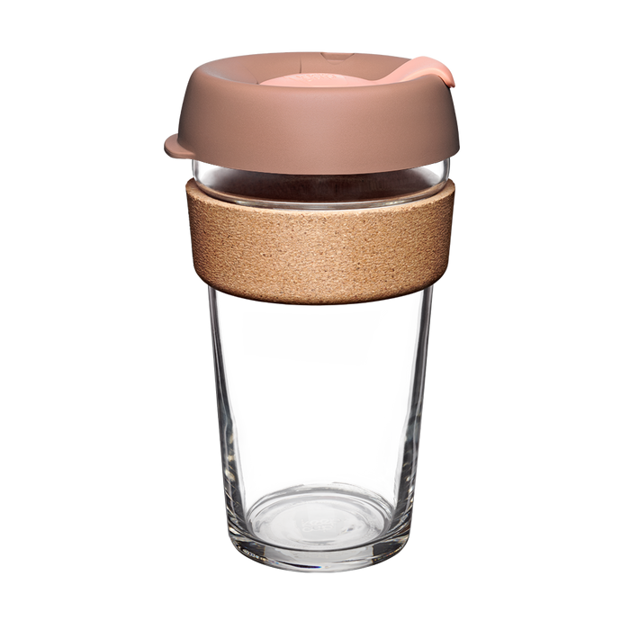 KeepCup Brew Cork L 16oz in Frappe colour, featuring a clear tempered glass cup with natural cork band and dusty pink silicone lid with sipper opening, shown on a plain white background.