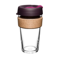 KeepCup Brew Cork L 16oz in Nutmeg, featuring a clear tempered glass cup with natural cork band, dark purple lid and pink plug, shown against a white background in a straight-on product shot.