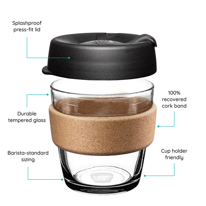 KeepCup glass coffee cup with cork band and black lid, featuring text on a white background.