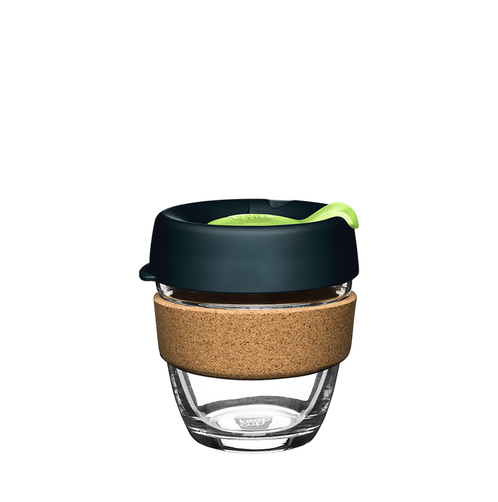 KeepCup Brew Cork S 8oz in Deep, featuring a clear glass cup with natural cork band, dark navy silicone lid and bright green plug, shown against a plain white background.