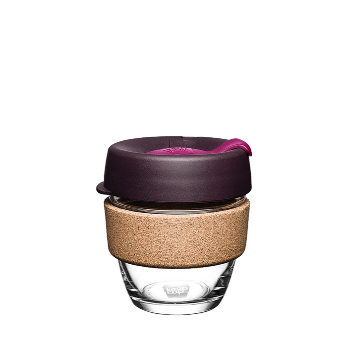 KeepCup Brew Cork S 8oz in Nutmeg, featuring a clear tempered glass cup with natural cork band, dark plum-coloured lid and bright pink plug, shown on a plain white background.