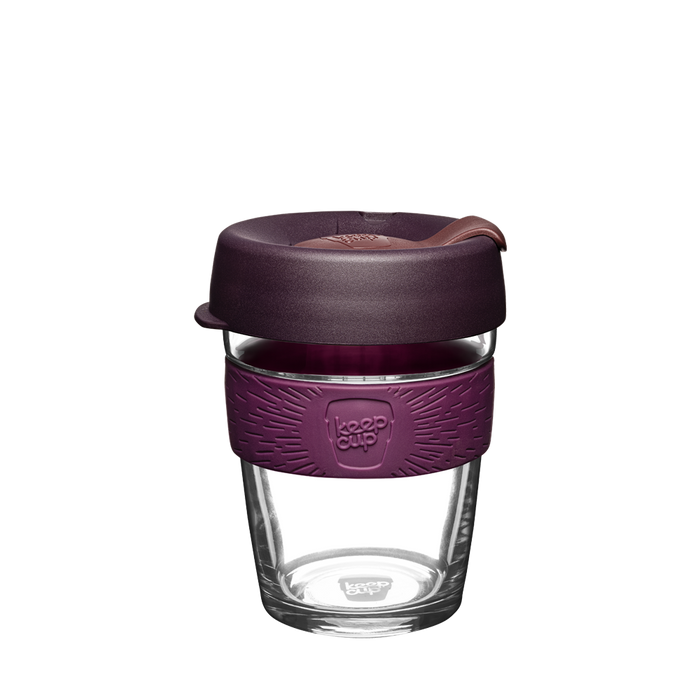 KeepCup Brew M 12oz in Alder, featuring a clear tempered glass cup with a deep plum silicone band and matching dark aubergine lid with sipper, shown against a white background.