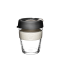 KeepCup Brew M 12oz in Press colour, featuring a clear glass cup with a cream-coloured silicone band and charcoal lid with sipper closure, shown against a white background.