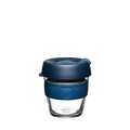 KeepCup Brew XS 6oz in Spruce, featuring a clear glass cup with a deep blue silicone band and matching navy lid with sipper opening, shown against a plain white background.