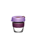 KeepCup Brew XS 6oz in Vanda, featuring a clear tempered glass cup with a deep plum silicone band and light lavender lid with sipper plug, shown against a white background.