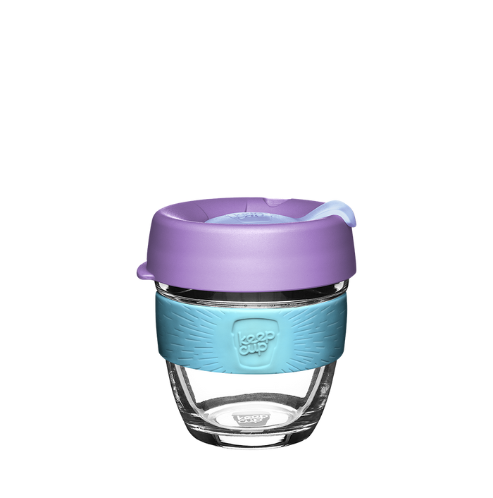 KeepCup Brew S 8oz in Moonlight, featuring a clear tempered glass cup with a light blue silicone band and lavender-coloured lid with sipper, shown against a white background.