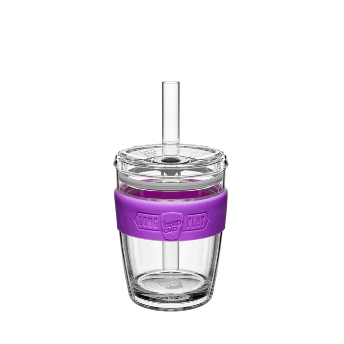 KeepCup Cold Cup Longplay Boba in Bubblegum, medium 12oz size, shown from the front featuring a clear double-walled glass cup with purple silicone band embossed with "Long Play" text, clear lid and reusable glass straw.