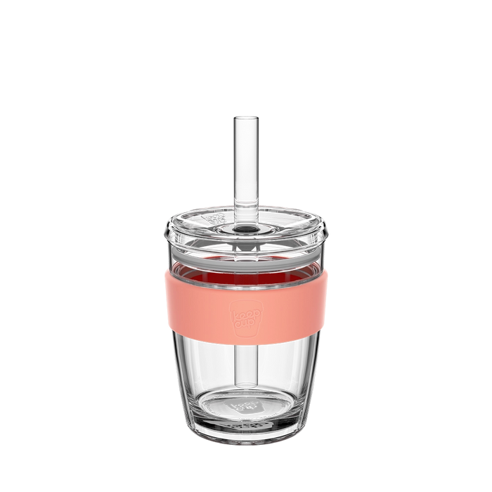 KeepCup Cold Cup Longplay Boba M 12oz in Clay, shown from the front on a plain white background. The clear double-walled glass cup features a peach-coloured silicone band, transparent lid and reusable glass straw.