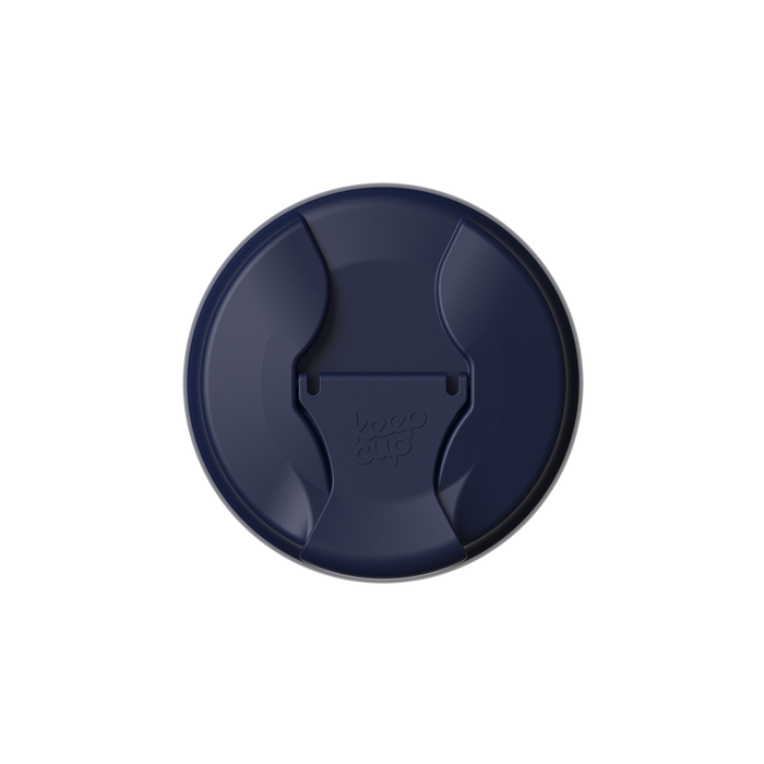 Top-down view of a navy Commuter Flip Lid showing the closed drinking spout and embossed KeepCup logo on the flip tab.