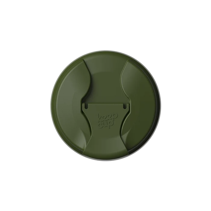 Top-down view of the KeepCup Commuter Flip Lid in Pine, showing the olive green circular lid with curved drinking opening and embossed KeepCup logo on the flip closure.