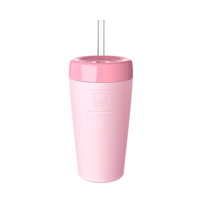 KeepCup Commuter Cold Cup L 16oz in Pashmak Pink, shown in a product studio shot featuring the pale pink reusable cup with matching lid and clear straw, displaying the embossed KeepCup logo on the silicone band.