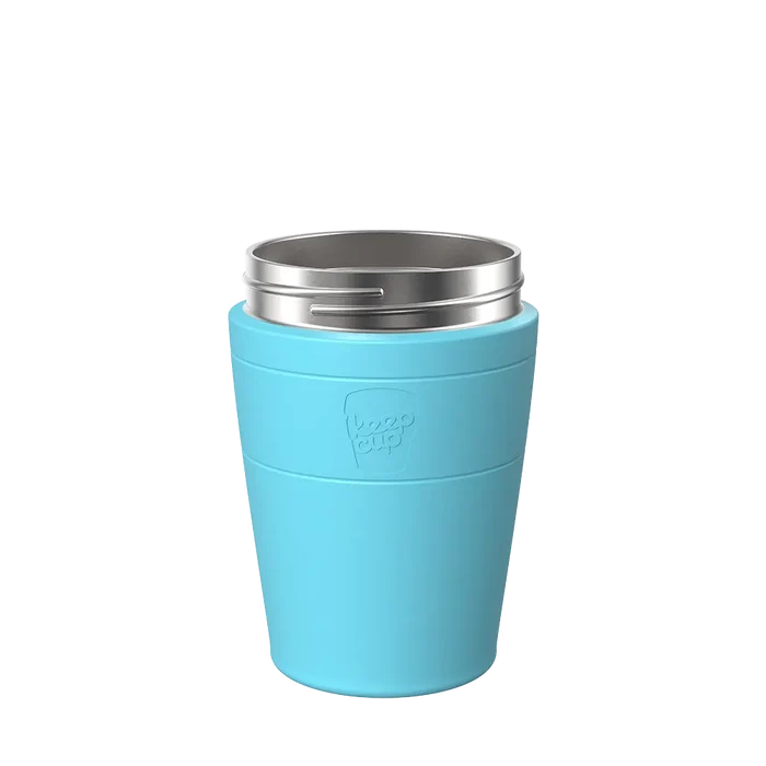 KeepCup Helix Stainless Steel Base in Cloud, a light blue reusable cup with silver stainless steel rim, shown from a front angle against a white background.