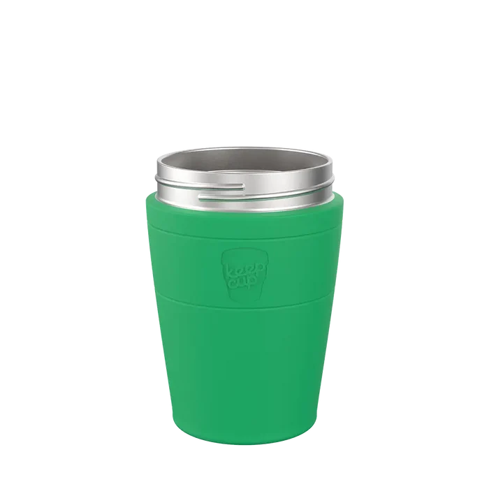 KeepCup Helix Stainless Steel Base in Emerald, M 12oz size, shown from a front angle against a white background, featuring a vibrant green band with embossed KeepCup logo and silver stainless steel rim.