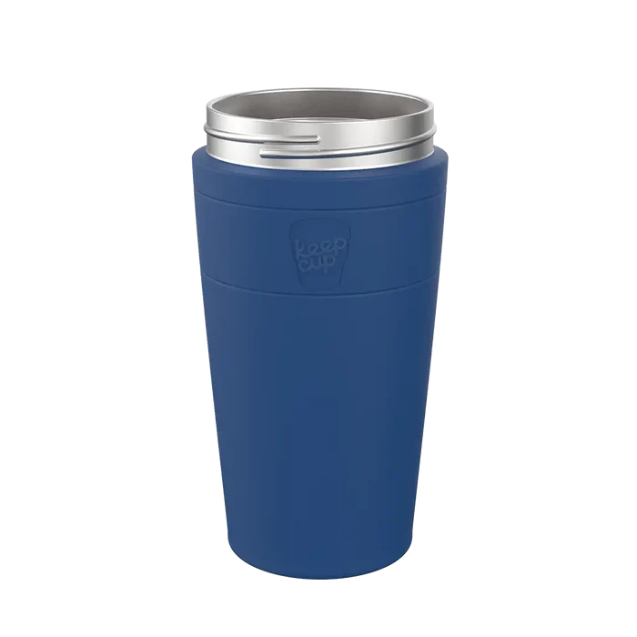 KeepCup Helix Stainless Steel Base L 16oz in Cobalt, shown upright against a plain background, featuring a deep blue sleeve with embossed logo and silver stainless steel rim.