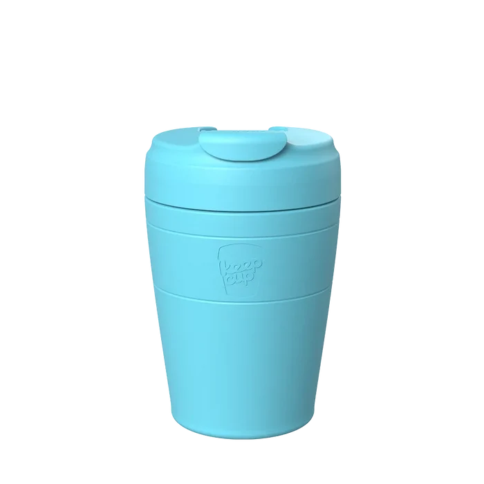 KeepCup Commuter M 12oz in Cloud, a light blue reusable coffee cup with secure flip-top lid, shown from the front against a white background displaying the embossed KeepCup logo.