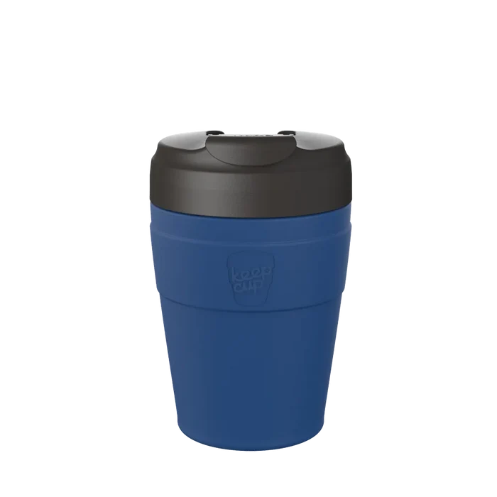 KeepCup Commuter M 12oz in Cobalt Black, featuring a deep blue reusable cup body with black lid, shown against a plain white background in a straight-on product shot.