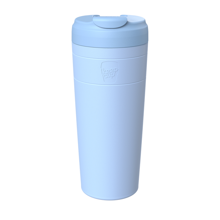 KeepCup Commuter XL 20oz in Orchid, a light blue reusable travel mug with matching lid featuring a flip-top drinking spout, shown from a front angle against a white background.