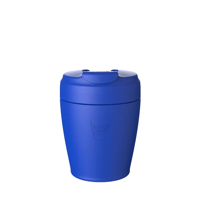 KeepCup Commuter S 8oz in Electric Blue, shown upright against a white background, featuring a matching blue lid with flip-top closure and the embossed KeepCup logo on the reusable cup body.