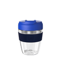 KeepCup Commuter Light M 12oz in Electric Ink, featuring a clear lightweight plastic cup with dark navy silicone band and bright blue lid, shown against a white background.