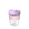 KeepCup Commuter Light M 12oz in Lilac, featuring a clear glass cup with soft pink silicone band and lavender-coloured lid with sipper closure, shown against a white background.