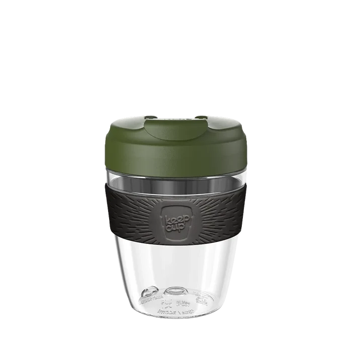 KeepCup Commuter Light M 12oz in Pine, featuring a clear lightweight plastic cup with olive green lid and charcoal grey silicone band, shown against a white background.