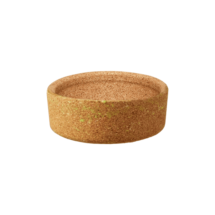 Cork Ace Band for Glass KeepCup in size S/M/L, shown as a standalone circular cork sleeve with natural brown texture and subtle green marbling, photographed from a slight angle against a white background.