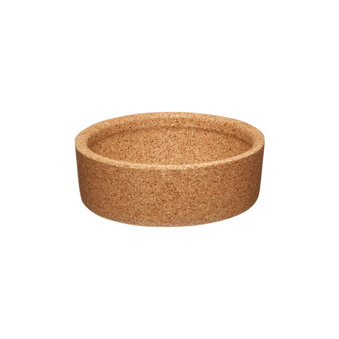 Cork Band for KeepCup Glass in natural cork colour, shown as a circular replacement band photographed from a slight angle against a white background, displaying the textured cork material and shallow bowl shape.