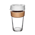 Design Your Own Brew Cork L 16oz reusable coffee cup photographed against a white background, featuring a clear tempered glass body, natural cork band for heat protection, and white silicone lid with a closable drinking spout.
