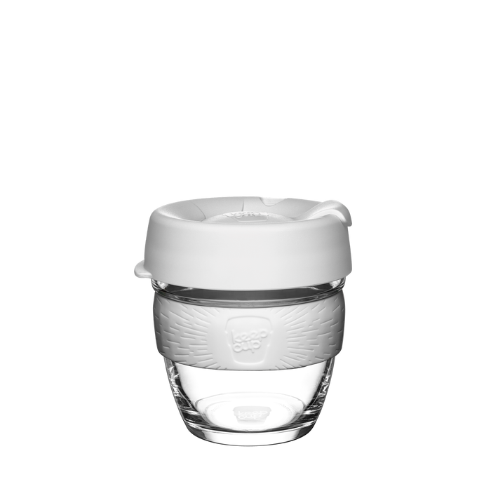KeepCup Brew in a custom design featuring a clear glass cup with a light grey silicone band and white lid, shown against a plain white background.