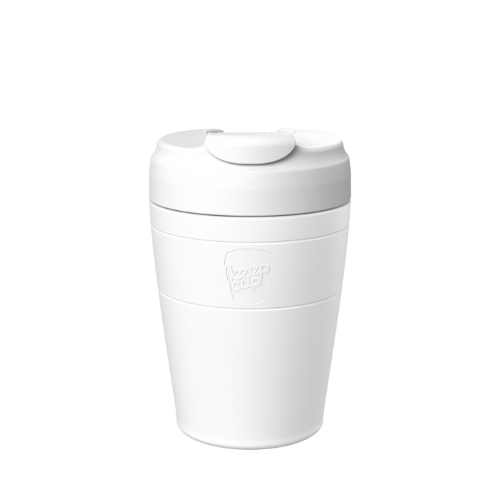 A white Design Your Own Commuter KeepCup reusable coffee cup shown against a plain white background, featuring the embossed KeepCup logo on the body and a flip-top lid with sipper opening.