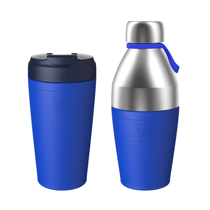 KeepCup Deskside Warrior set in Electric blue, featuring a reusable thermal cup with dark navy lid alongside a stainless steel water bottle with matching blue silicone base and carry loop, displayed against a white background.