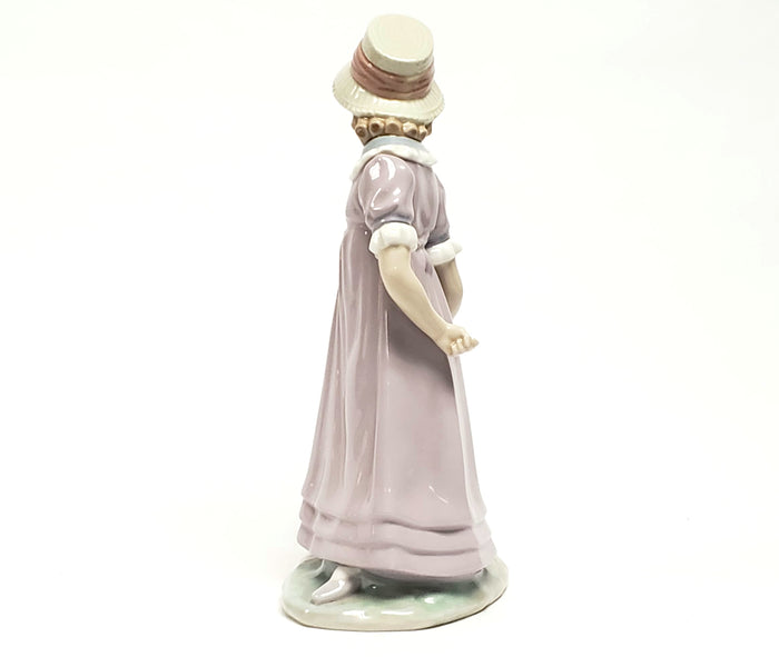 Girl With Toy Wagon, Retired Porcelain Figurine by Lladro 1978