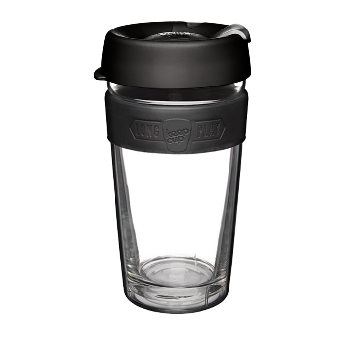 KeepCup Brew Longplay L 16oz in Black, featuring a double-walled glass cup with dark grey silicone band embossed with "Long Play" and KeepCup logo, topped with a black press-fit lid, shown against a white background.