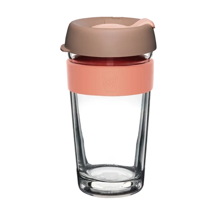 KeepCup Brew Longplay in Canna, L 16oz, featuring a double-walled glass cup with a coral-coloured silicone band and taupe lid with pink sipper, shown against a white background.