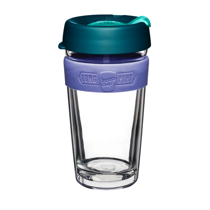 KeepCup Brew Longplay L 16oz in Haze, featuring a double-walled clear glass cup with lavender silicone band and deep teal lid with mint plug, shown against a white background.