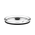 Go Bowl Flat Lid in Black, shown from a low side angle against a white background, featuring a clear plastic lid with a central black vent button and black silicone seal ring around the base.