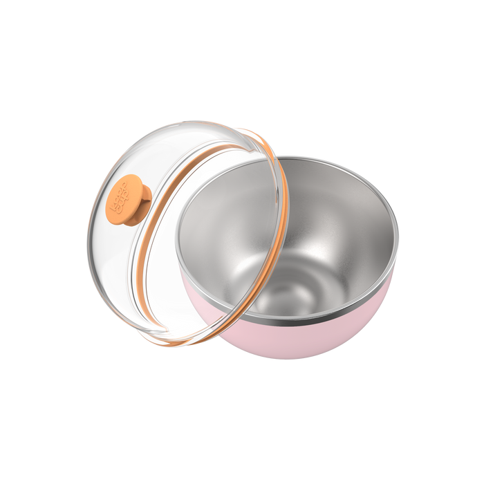 KeepCup Go Bowl Luxe in Pashmak Pink shown from above at an angle, with the clear dome lid with orange silicone seal and vent button lifted away to reveal the stainless steel interior and soft pink outer bowl.