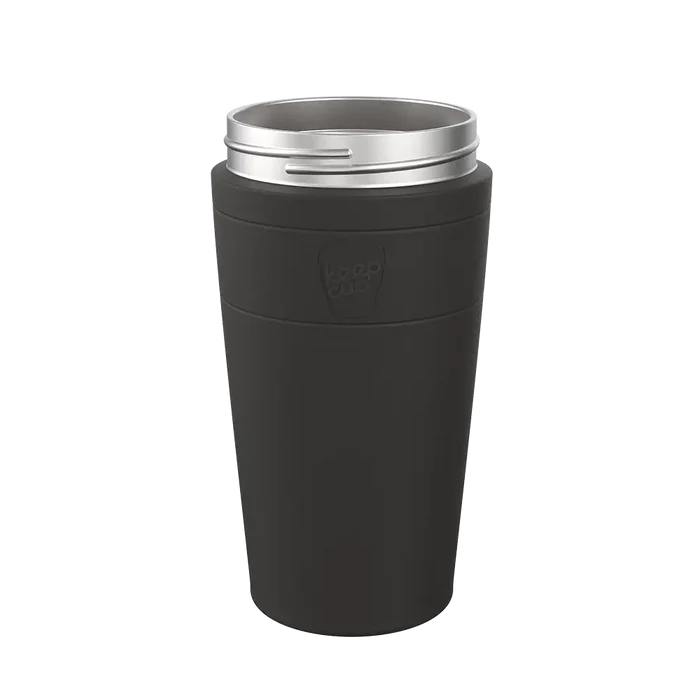 KeepCup Helix Stainless Steel Base in Black, L 16oz, shown from a front angle against a neutral background, featuring a matte black exterior with embossed KeepCup logo and silver stainless steel rim.
