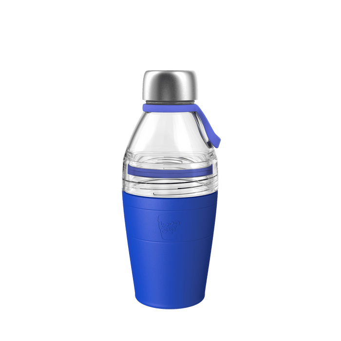 KeepCup Helix Bottle Clear Top 530ml in Electric, featuring a clear glass upper section with stainless steel cap, blue silicone carry loop, and vibrant blue silicone sleeve with embossed KeepCup logo, shown against a white background.