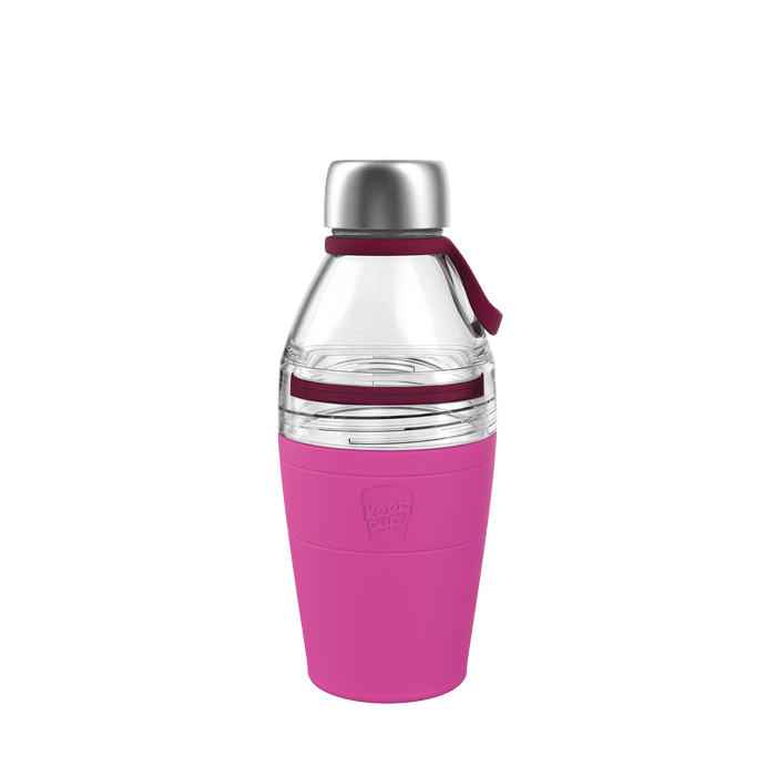 KeepCup Helix Bottle Clear Top 530ml in Fuchsia, featuring a clear tritan top section with stainless steel cap, burgundy carry loop, and bright pink silicone sleeve with embossed KeepCup logo, shown against a white background.