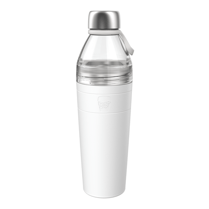 KeepCup Helix Bottle Clear Top 770ml in White, shown at a slight angle against a plain white background, featuring a stainless steel cap with carry loop, clear upper section, and white insulated lower body with embossed KeepCup logo.