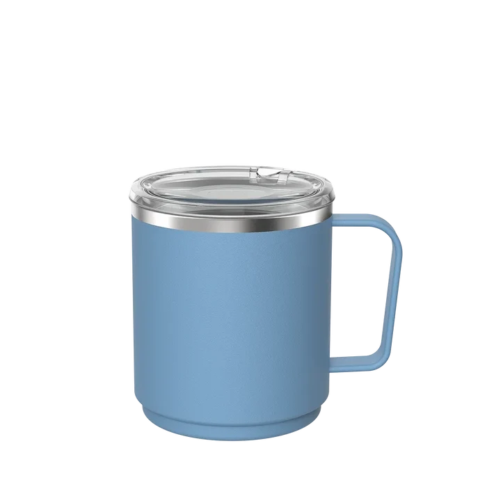 KeepCup Camp Mug M 12oz in Mist, a light blue insulated stainless steel mug with matching handle and clear sliding lid, shown at a three-quarter angle against a white background.