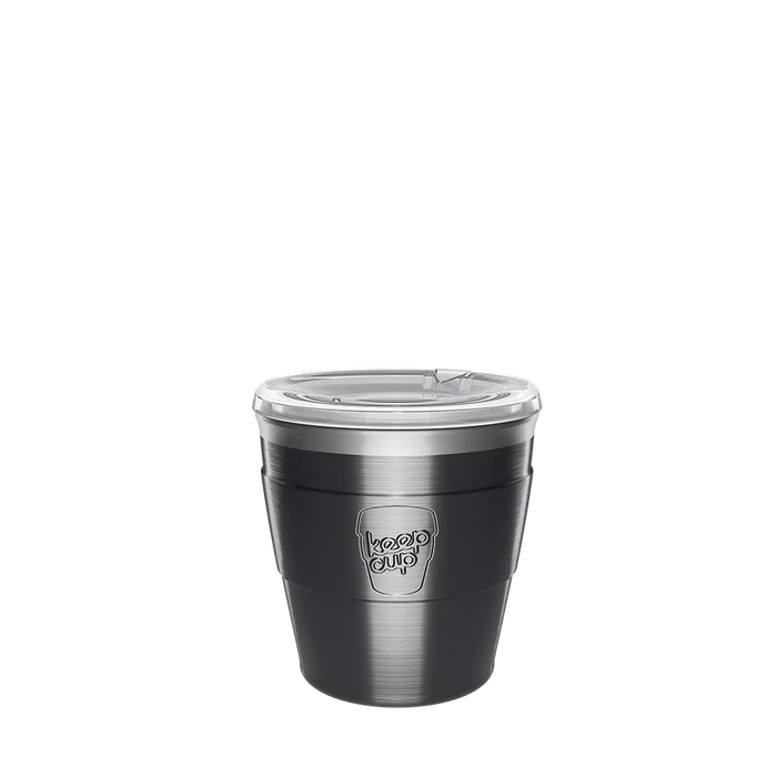 KeepCup Thermal Quicksip XS 6oz in Nitro, a brushed dark steel reusable cup with clear plastic lid featuring a sip opening, shown against a plain white background.