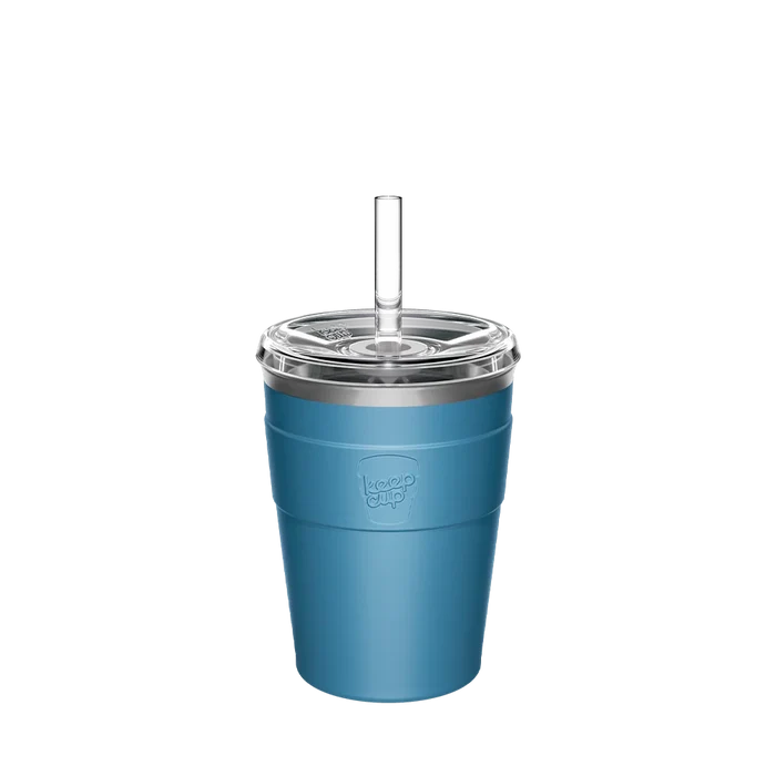 KeepCup Cold Cup Thermal M 12oz in Kingfisher, a matte blue reusable cup with stainless steel rim, clear plastic lid, and transparent straw, shown against a white background.