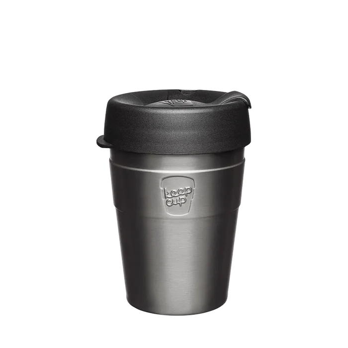 KeepCup Thermal M 12oz in Nitro Black, featuring a brushed stainless steel body with embossed logo and black lid with sipper closure, shown front-on against a white background.